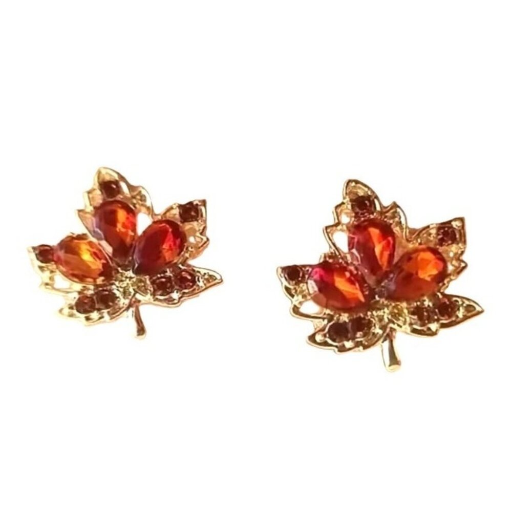 Maple Leaf Shaped Gold Tone Stud Earrings With Red Crystal Accents